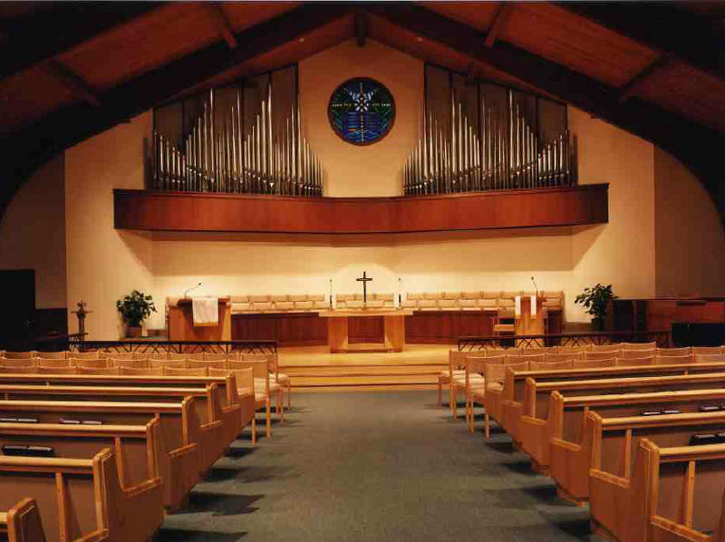 A combination of pews and chairs and a removable communion rail allow for a great deal of flexibility for worship services.